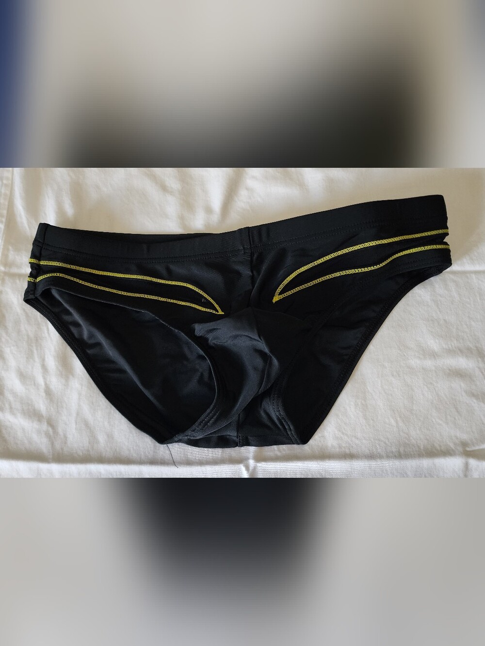 Men's Black Swim Brief with Yellow Stitch Accents And See Thru Net